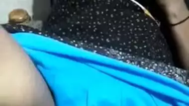 Whore is talking on the phone while lover is touching her Desi vag