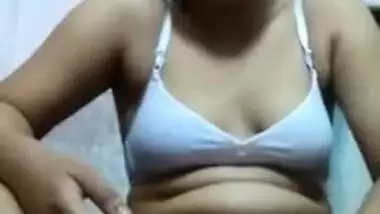 Lovely Desi teen in sexy bra rubs moist XXX vagina in the bathroom
