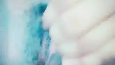 Desi girl shows off and rubs her hairy XXX sex hole in solo porn