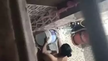 Neighbor aunty taking bath caught by voyeur