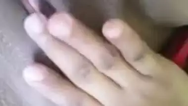 Desi chick in a red dress performs a sex show with XXX tits and vagina