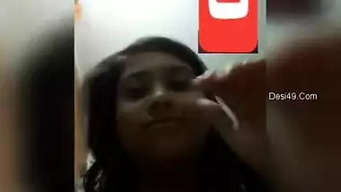 Young Indian woman shows off her XXX tits for online fan on phone camera