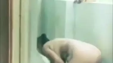 A chubby Desi aunty bathing outdoor nude on cam for her lover XXX video