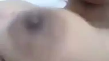 Awesome Desi chick plays with her sexy XXX breasts for the camera