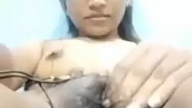 XXX Desi girl's twat isn't shaved in homemade MMS video show on camera
