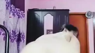 Nerdy college girl from India shakes big buttocks and spanks it