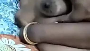 Desi MILF with big XXX tits is fingered by cameraman leaking the video