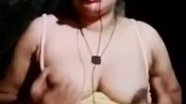 Plump Desi bhabhi gets topless to play with tits on live XXX cam