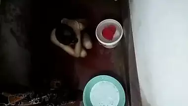 Hidden footage of naked XXX Desi housewife relaxing in the bathroom