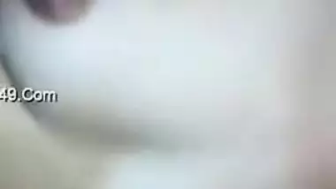 Lewd girl from India advertises her small boobies on camera in close-up