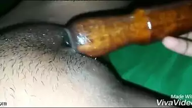 Indian MILF plays sex games with a XXX rolling pin in her sex hole