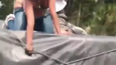 Daring NRI porn of a girl fucking outdoors on a riding truck