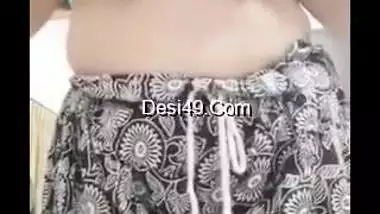 Indian aunty sucks her own finger and strips down in her XXX show