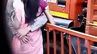 Voyeur films a man who hugs Desi babe and feels up her XXX boobs