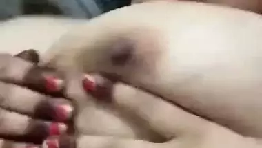 Huge boobs Indian aunty crushing her breast MMS