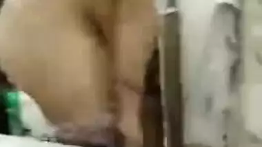 Dude XXX records hot Desi wife putting clothes on after having sex