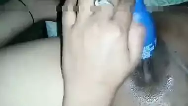 Hot Desi female shows off her smooth XXX pussy shoving a sex toy inside