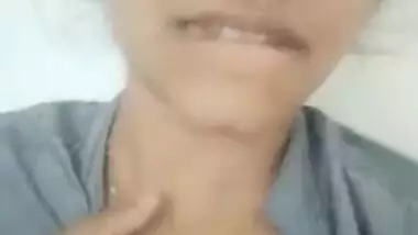 Young Desi cutie teases with her huge XXX melons for the camera