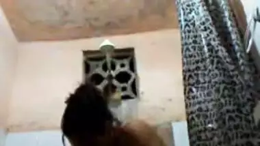 Nude Indian woman relaxes solo in the shower in amateur porn clip