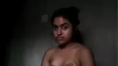 Modest Indian teen finds courage to pose naked in quick porn clip