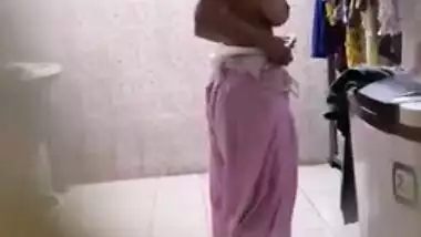 Guy dreams about sex while spying on cute Desi gal with big XXX boobs