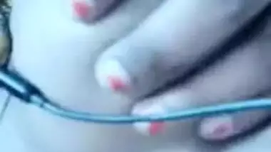 Slut exposes natural tits with dark nipples for XXX online Desi lover