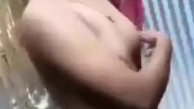 Slutty teen gal exposes perky Desi tits and cute twat in XXX clip