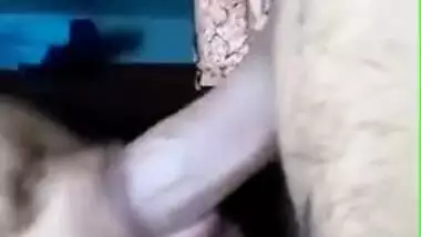 Deep XXX blowjob is what amateur Desi chick is busy doing on cam